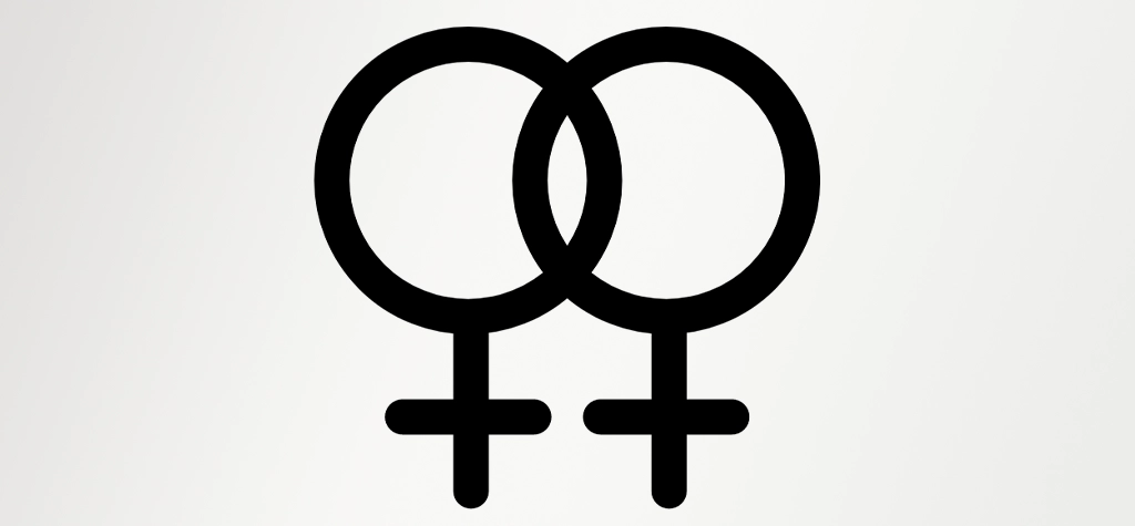 Die doppelte weibliche Glyphe, ein Zeichen mit Ursprung in der lesbischen und feministischen Bewegung der 1970er Jahre, symbolisiert Liebe zwischen Frauen, feministische Stärke und die Vielfalt der Geschlechteridentitäten. Es steht für Solidarität innerhalb der LGBT-Gemeinschaft, dient als Zeichen der Zugehörigkeit und hebt die Bedeutung von Sichtbarkeit und Kampf für Gleichberechtigung hervor. Trotz Kritik bezüglich seiner Darstellung der Geschlechtervielfalt, bleibt es ein wichtiges Symbol der Stärke und Einheit.